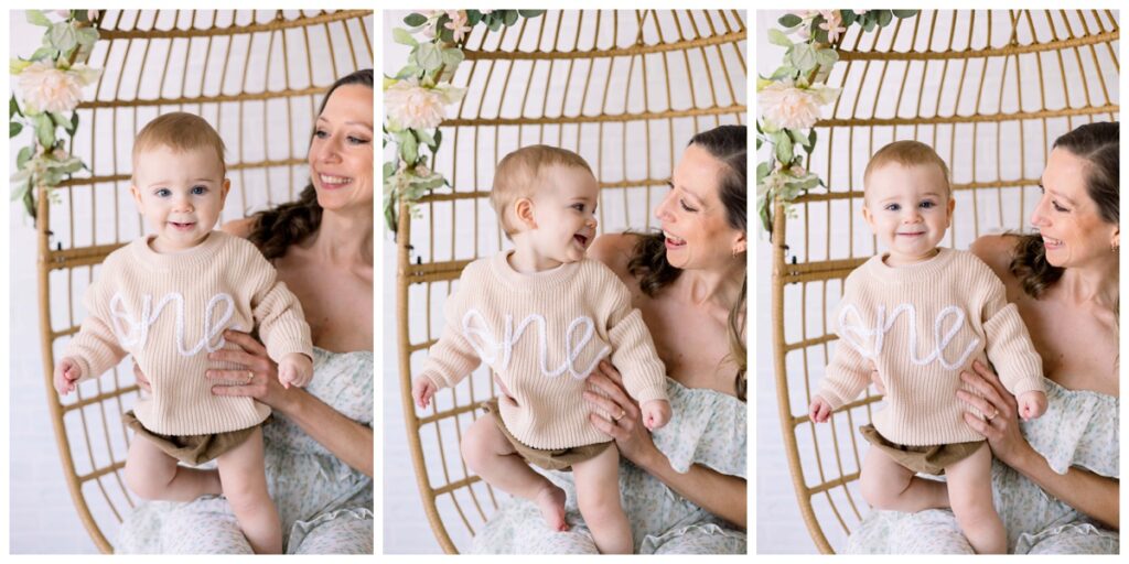 Toddler and mom snuggled up on egg chair for baby's first birthday photography session with Kathleen Jablonski Photography. 