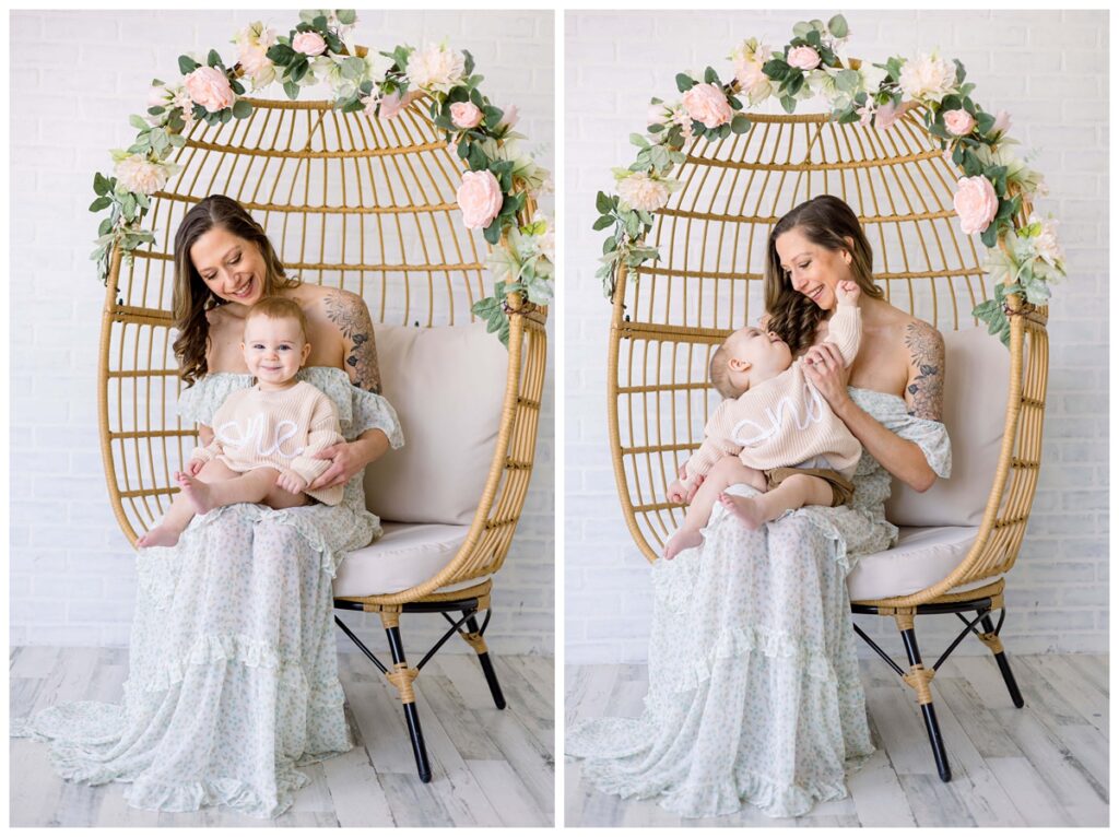 Mama and one year old toddler cuddling in floral egg chair in Kathleen Jablonski Photography studio.