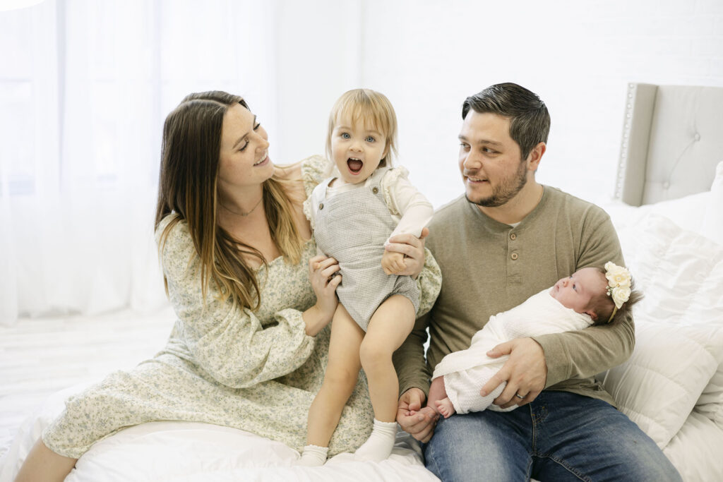 Family of 4 during newborn session with  NH Photographer Kathleen Jablonski Photography